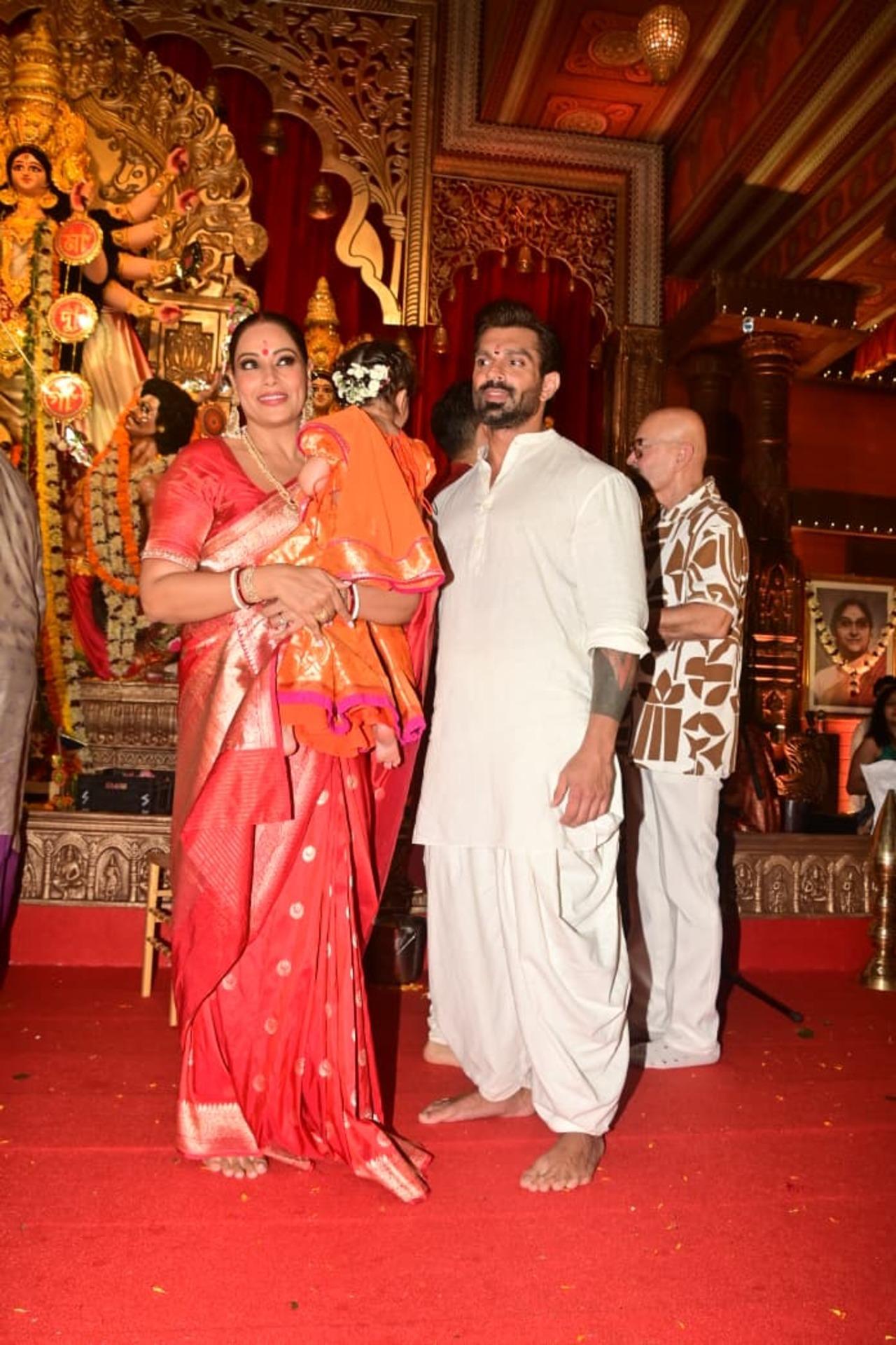 Bipasha Basu was also seen offering prayers at the North Bombay Sarbojanin Durga Puja pandal with husband Karan Grover and daughter Devi.